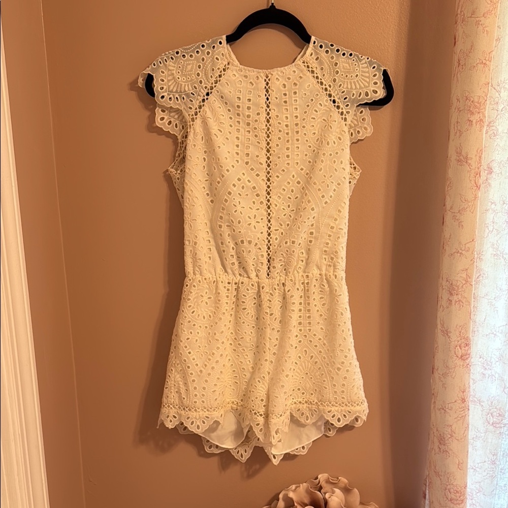 Saylor Cream Eyelet One Piece with Open Back and Tie Neck in Back